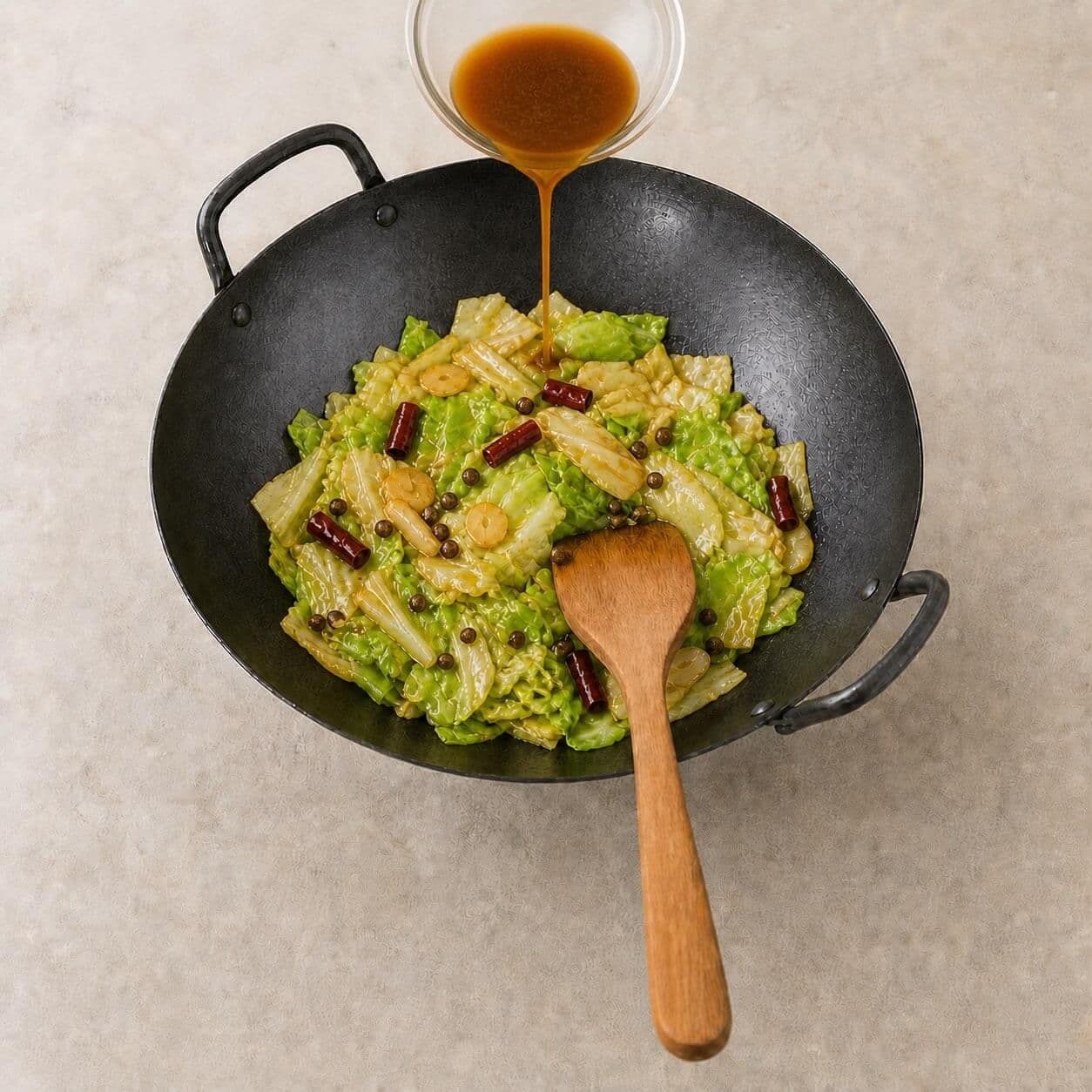 Add the sauce and finish quickly